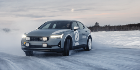 a Polestar 2 car sliding on ice in the Arctic Circle